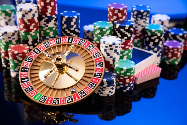 Baccarat table setup showing card staging area and commission payoff rules